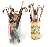 A CONTINENTAL MAJOLICA WALKING
