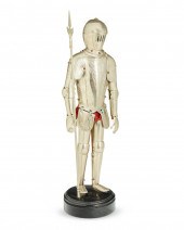 A CONTINENTAL MINIATURE SUIT O