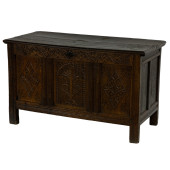 A CONTINENTAL OAK CHEST OR COF