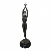 A CONTINENTAL PATINATED BRONZE