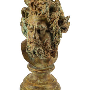 A Continental Patinated Bronze Head
