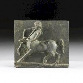 A CONTINENTAL PATINATED BRONZE