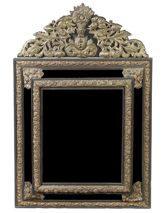 A Continental Pressed Brass and
