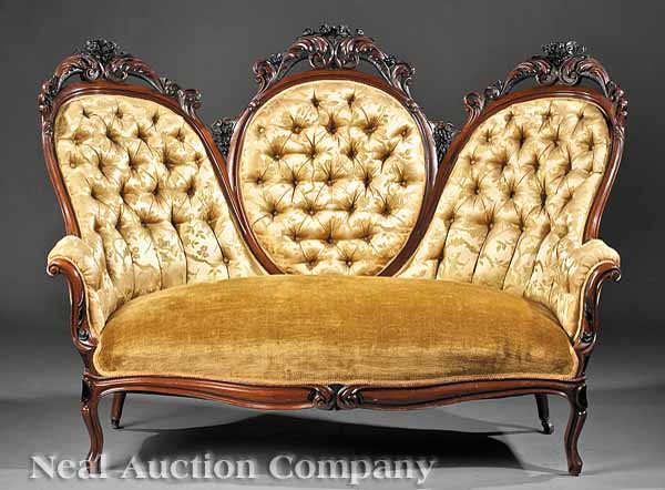 A Continental Rococo Revival Carved