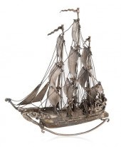 A CONTINENTAL SILVER-PLATED SH
