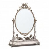 A CONTINENTAL SILVERPLATE FIGU
