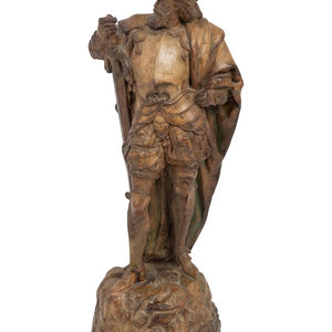 A Continental Terra Cotta Figure of