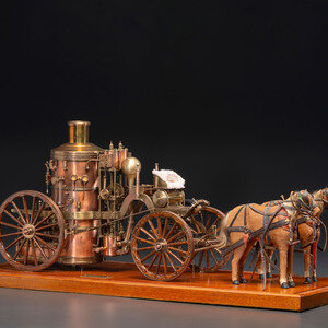 A Copper and Wood Horse-Drawn