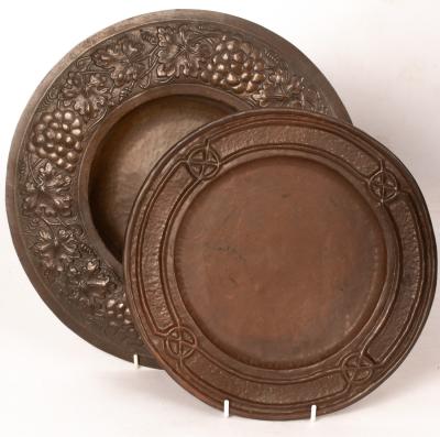 A copper charger with hammered