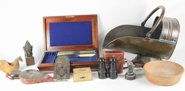 A copper coal scuttle a small