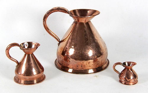 A copper gallon rum jug on a