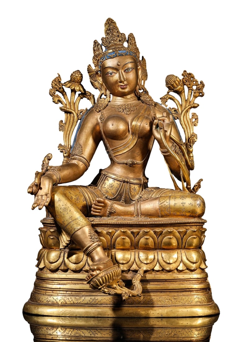 A COPPER-GILT LOTUS HAND