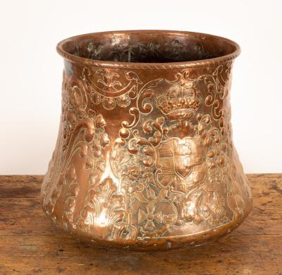 A copper log basket, embossed