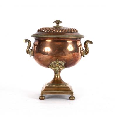 A copper samovar with ivory