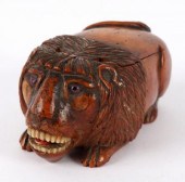A coquilla nut lion snuff box,