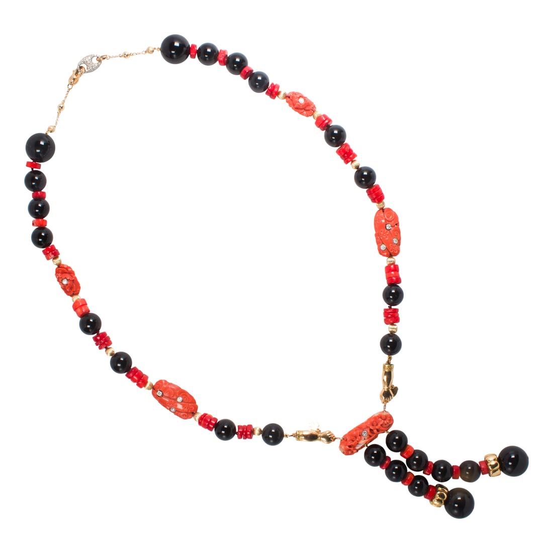 A CORAL, ONYX, DIAMOND AND GOLD