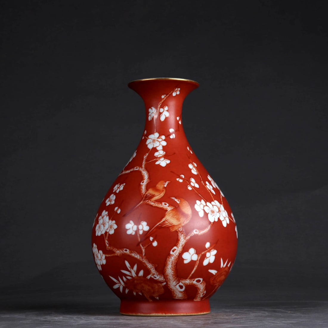 A CORAL-RED GLAZED AND WHITE