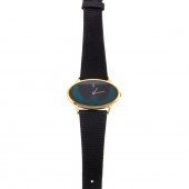 A CORUM 18K PEACOCK FEATHER DI