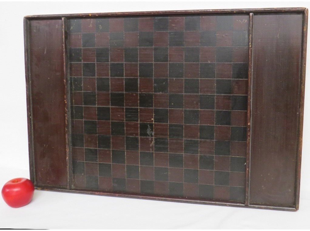 Price guide for A COUNTRY FOLK ART GAME BOARDThis