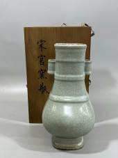 A CRACKLEWARE GLAZED VASE<br>A
