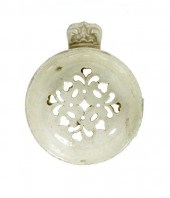 A CREAMWARE EGG DRAINER<br />