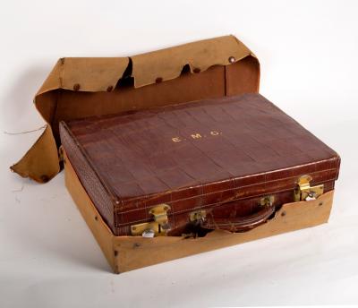 A crocodile skin suitcase, John