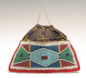 A CROW SINEW SEWN BEADED HIDE