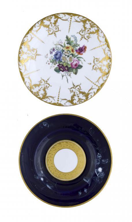 A CROWN DERBY PLATE painted