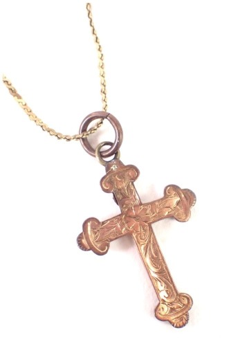 A crucifix pendant and chain, the