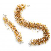 A CULTURED PEARL AND AMBER SUI