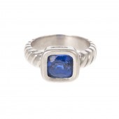A CUSHION-CUT SAPPHIRE RING IN