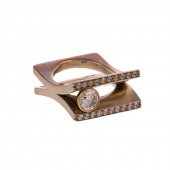 A CUSTOM DESIGNED RING BY RUSL