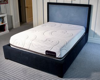 A custom made queen size, navy
