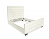 A CUSTOM TUFTED BEDA custom tu