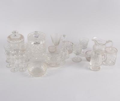 A cut glass biscuit barrel and