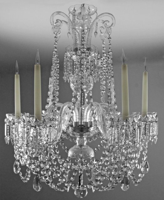 A cut glass chandelier hung