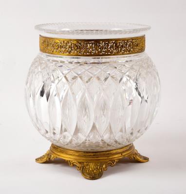 A cut glass vase with pierced