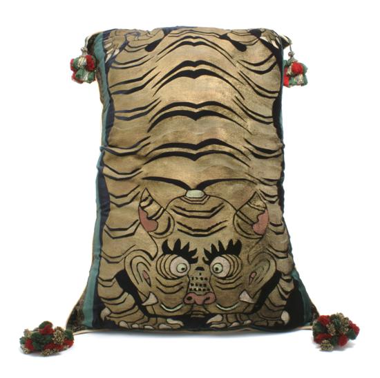 A Cut Silk Pillow depicting a