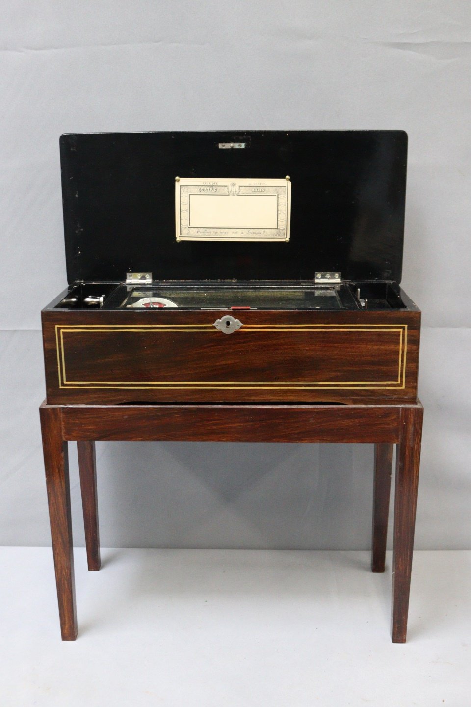 A CYLINDER MUSIC BOX ON STAND. From