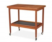 A DANISH MODERN TEAK FLIP-TOP