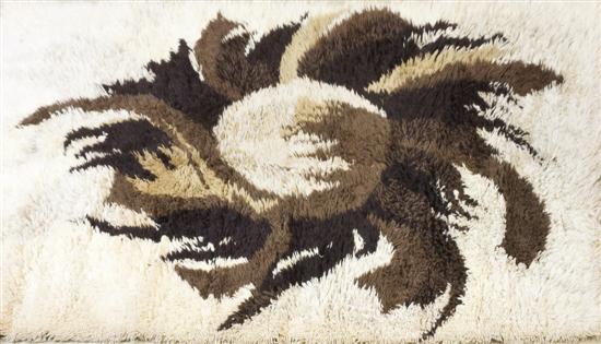 A Danish Rya Rug centered with