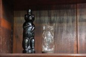A DARK AMBER GLASS BEAR FIGURA