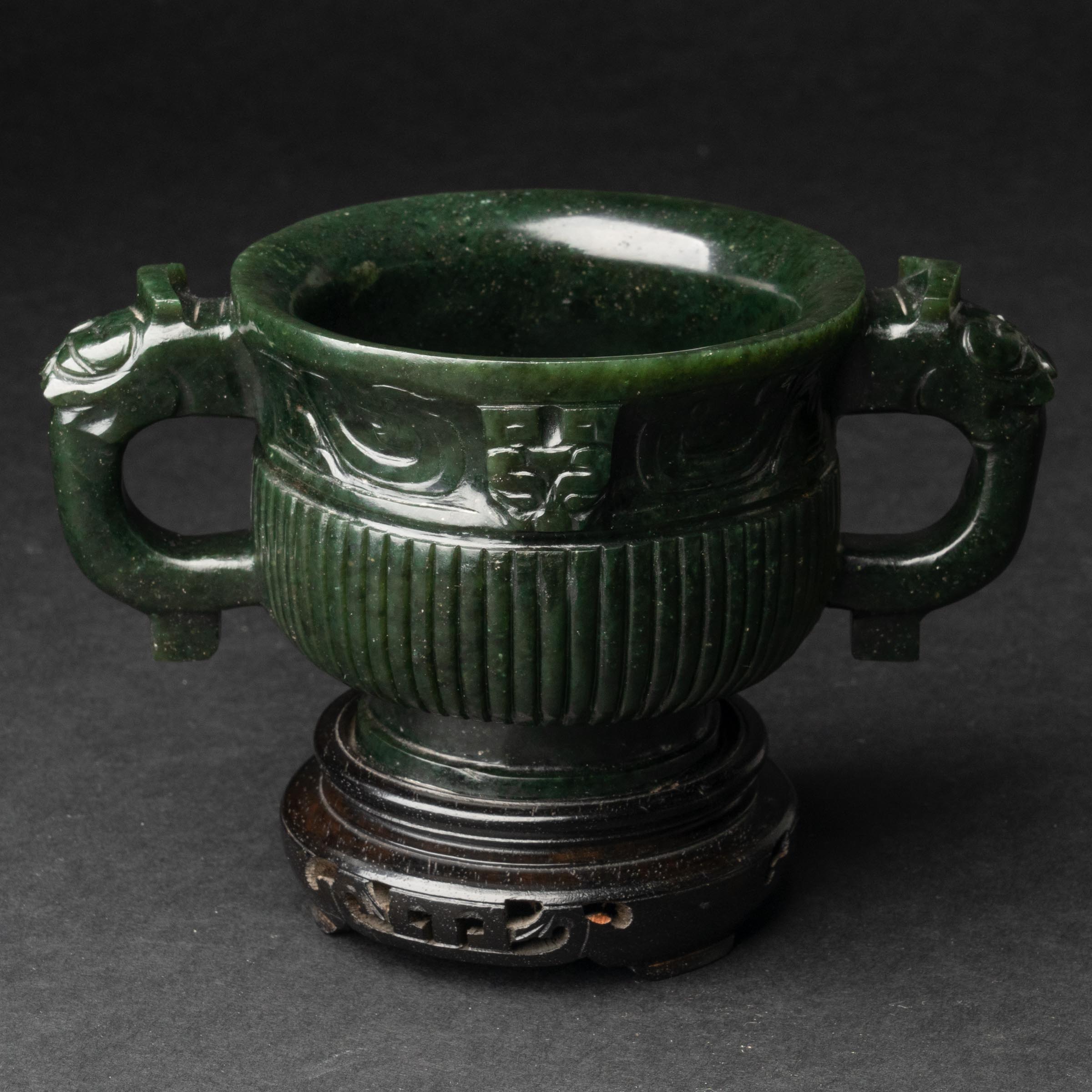 A Dark Green Archaistic Jade