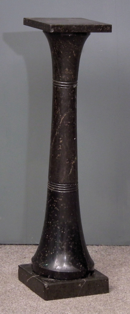 A dark green marble square topped