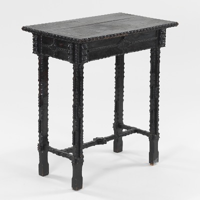 A Dark Painted Wood Tramp Art Table