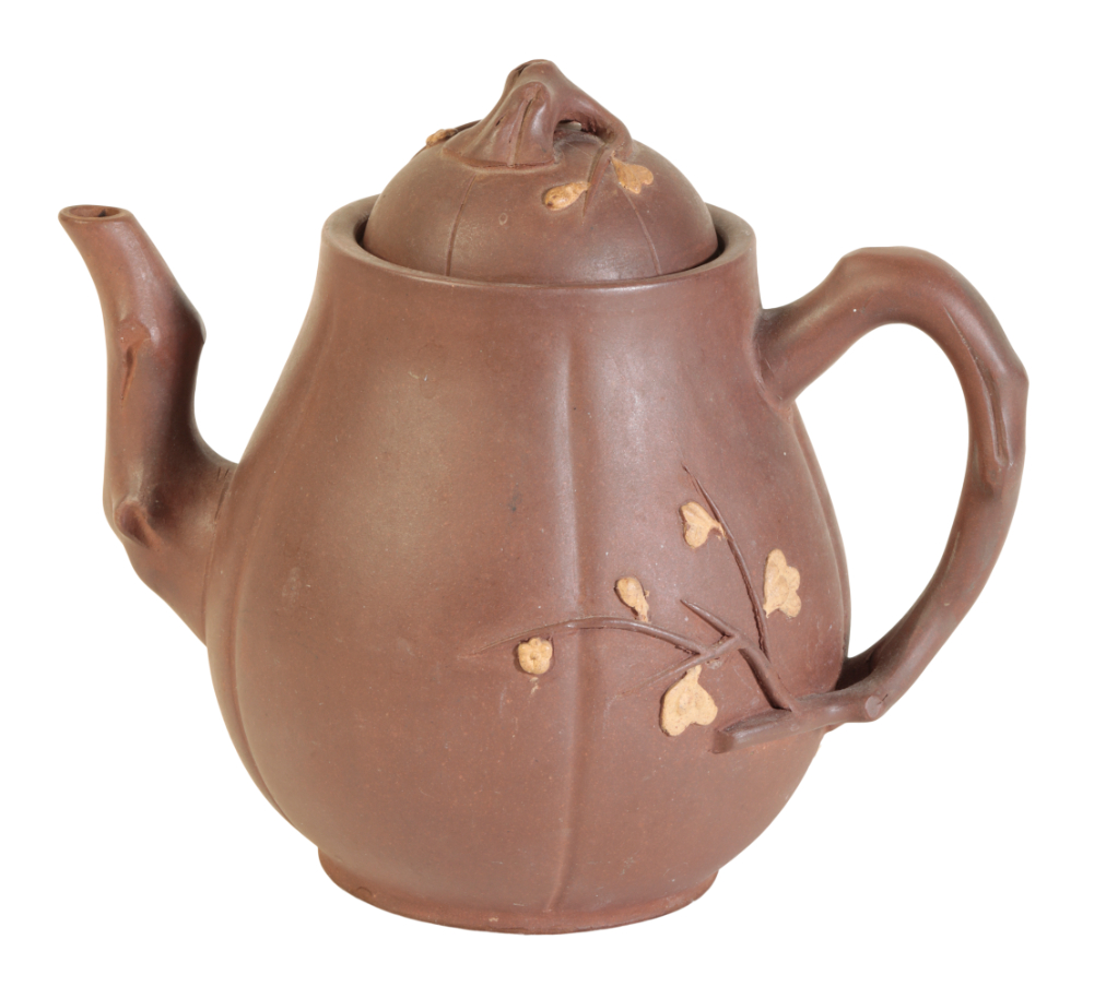 A DARK YIXING TEAPOT probably