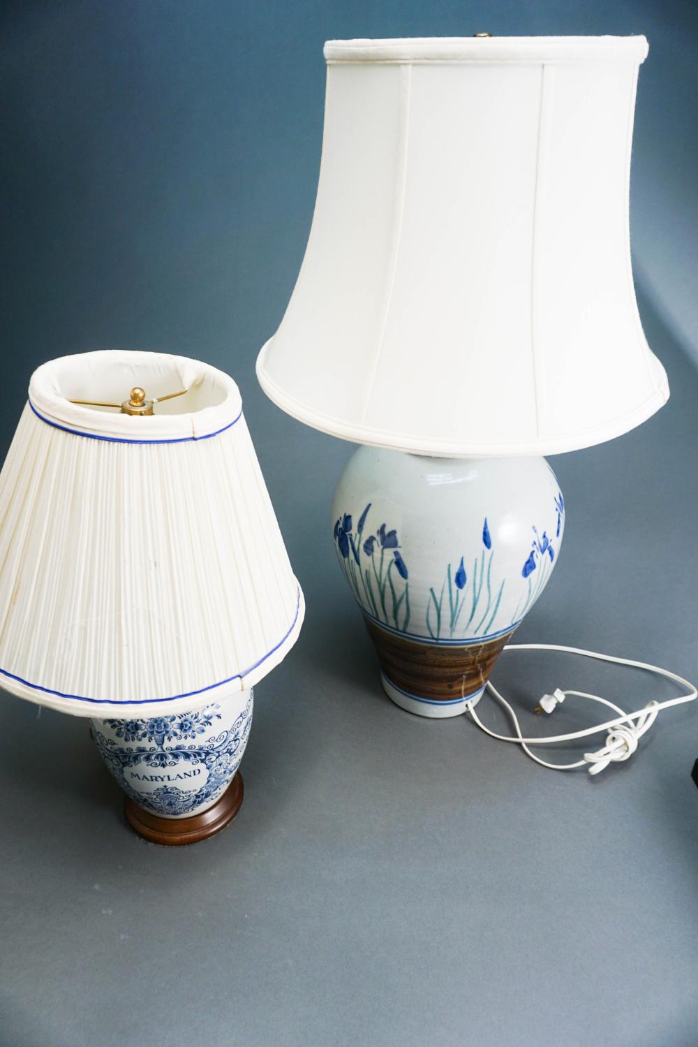 A DECORATED STONEWARE URN AND