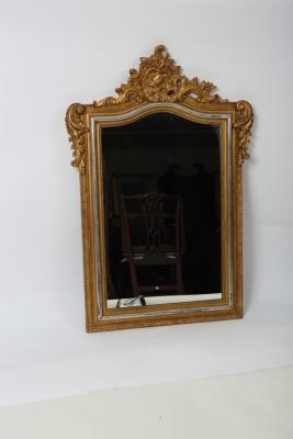 A decorative gilt framed wall