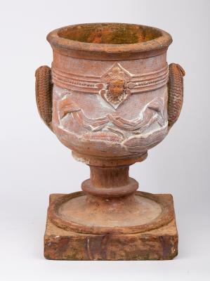 A decorative terracotta jardinière,