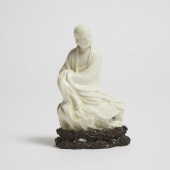 A Dehua Blanc de Chine Figure